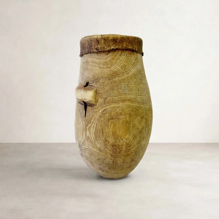 Turkana medium hand-carved wooden vessel on neutral background showing natural wood grain