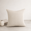 Una Cushion - Natural — slubbed natural weave with quiet tonal variation